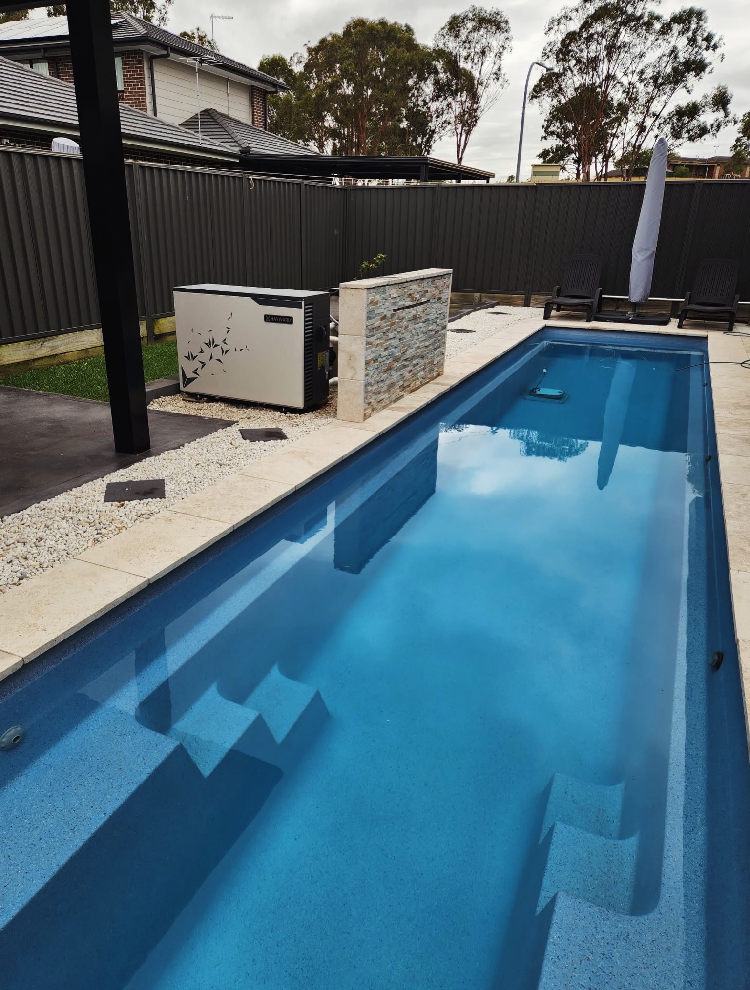 Pool heat pump installation by SJ Air technician in Sydney